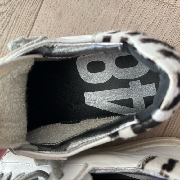 P448 John sneaker -zebra fur print on back
Woman’s size 37 (7) - Picture 9 of 11